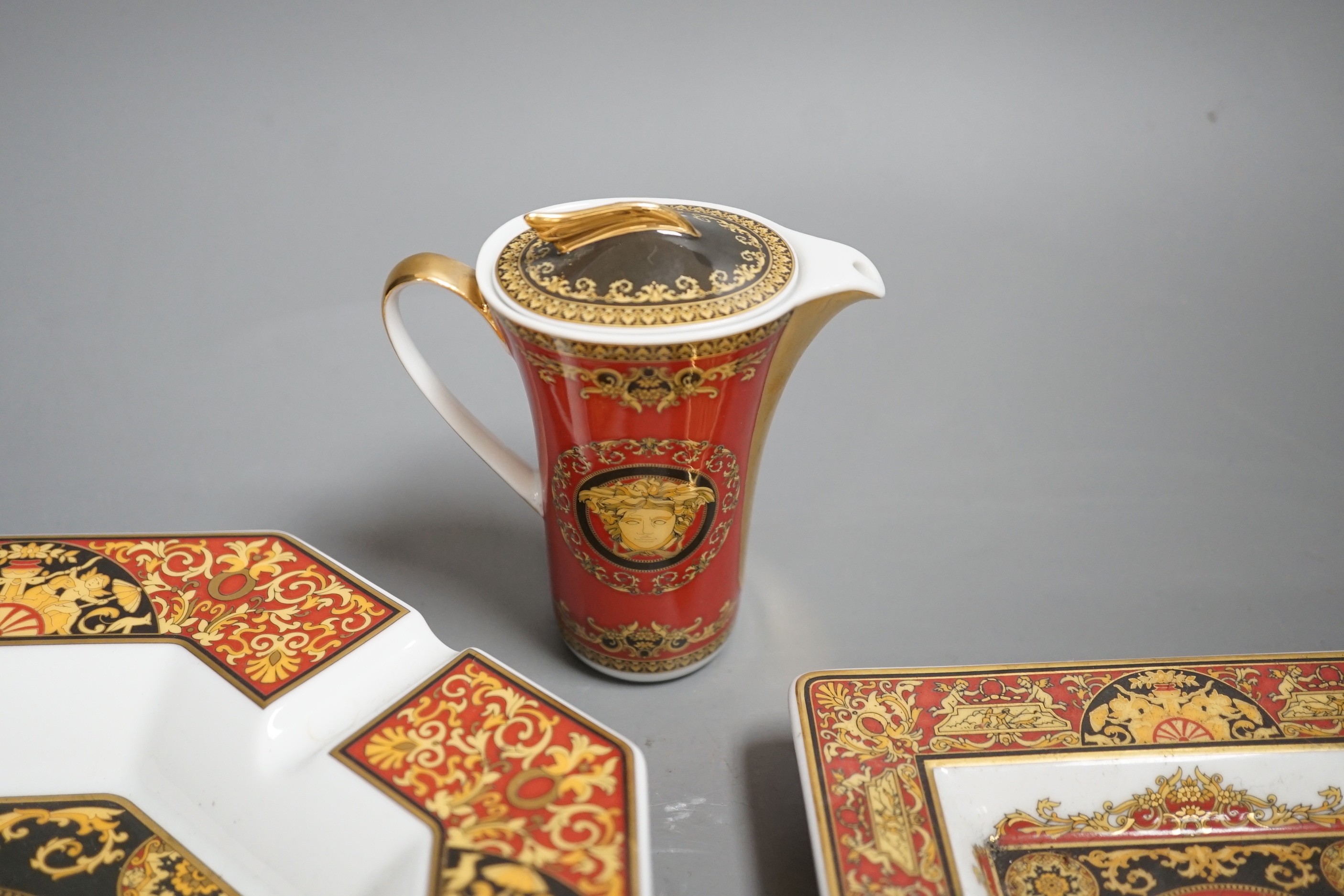 Rosenthal for Versace. A Medusa pattern ashtray, a pair of square dishes and a small jug